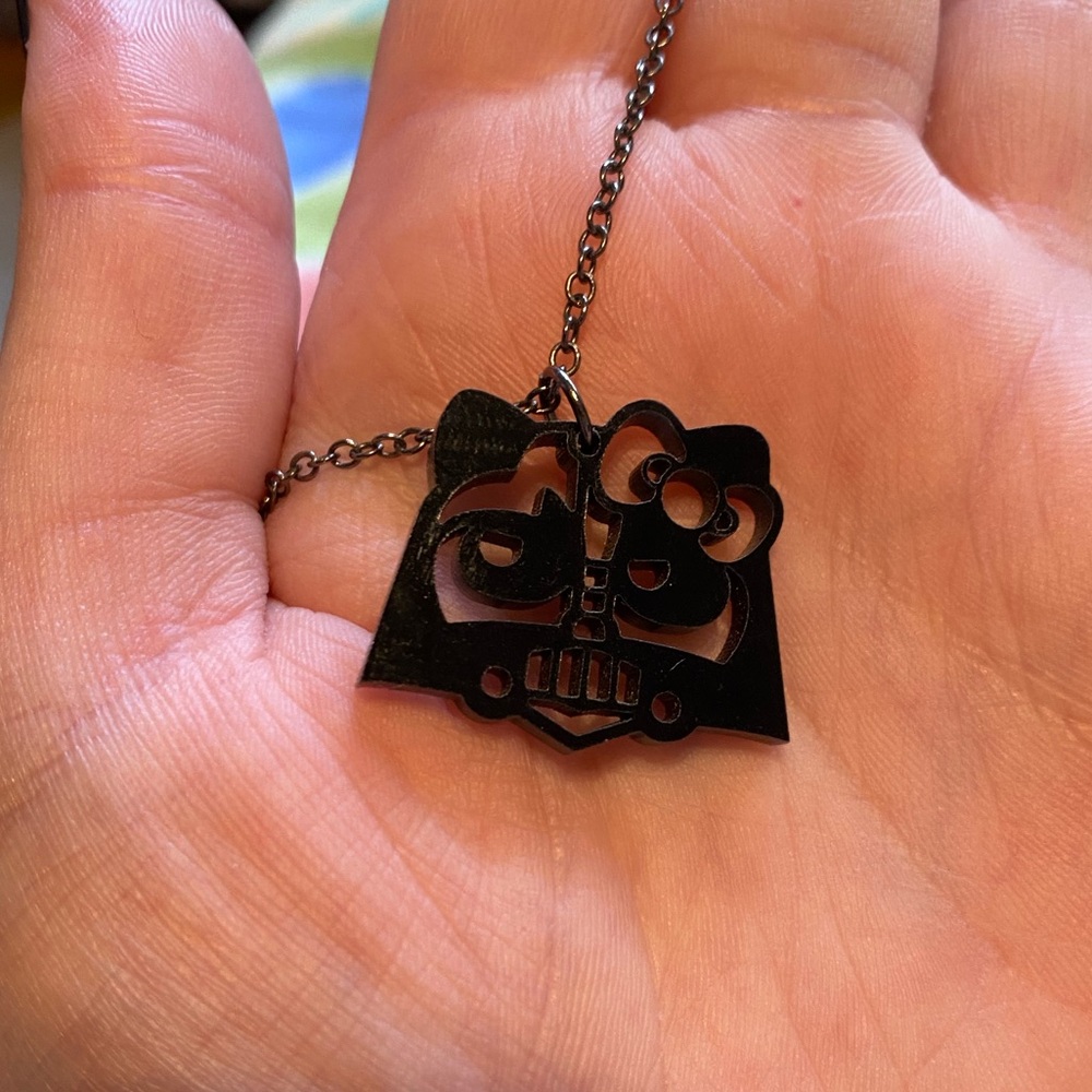 Hello Kitty Darth Vader necklace.